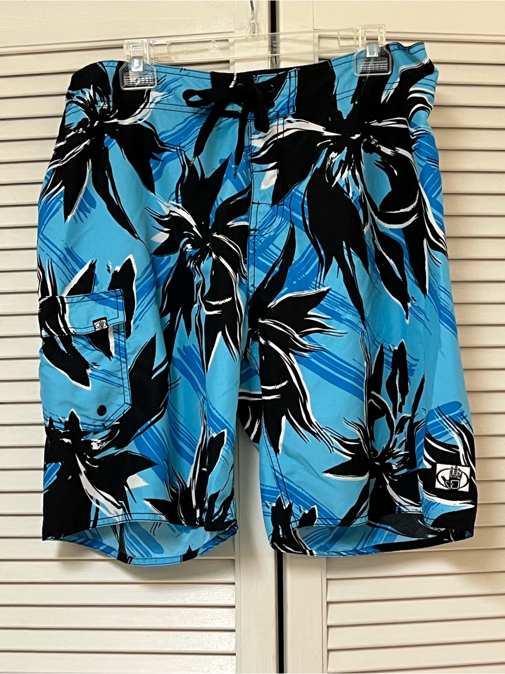 Body Glove Men's Blue and Black Tropical Print Board Shorts. - Size 34 - GUC